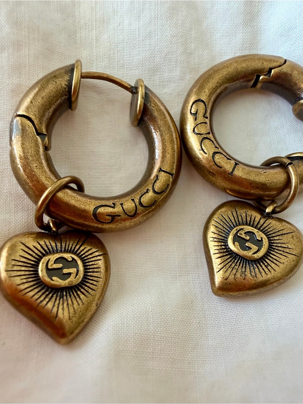 Gucci Antique Gold Heart Charm Hoop Earrings